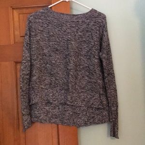 Loose, specked gray sweater